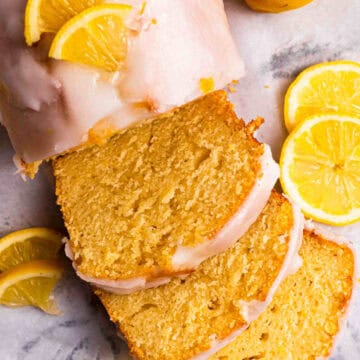 Sliced keto lemon cake with lemon garnish