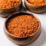 Suya spice in a wooden bowl