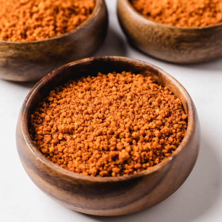 Suya spice in a wooden bowl