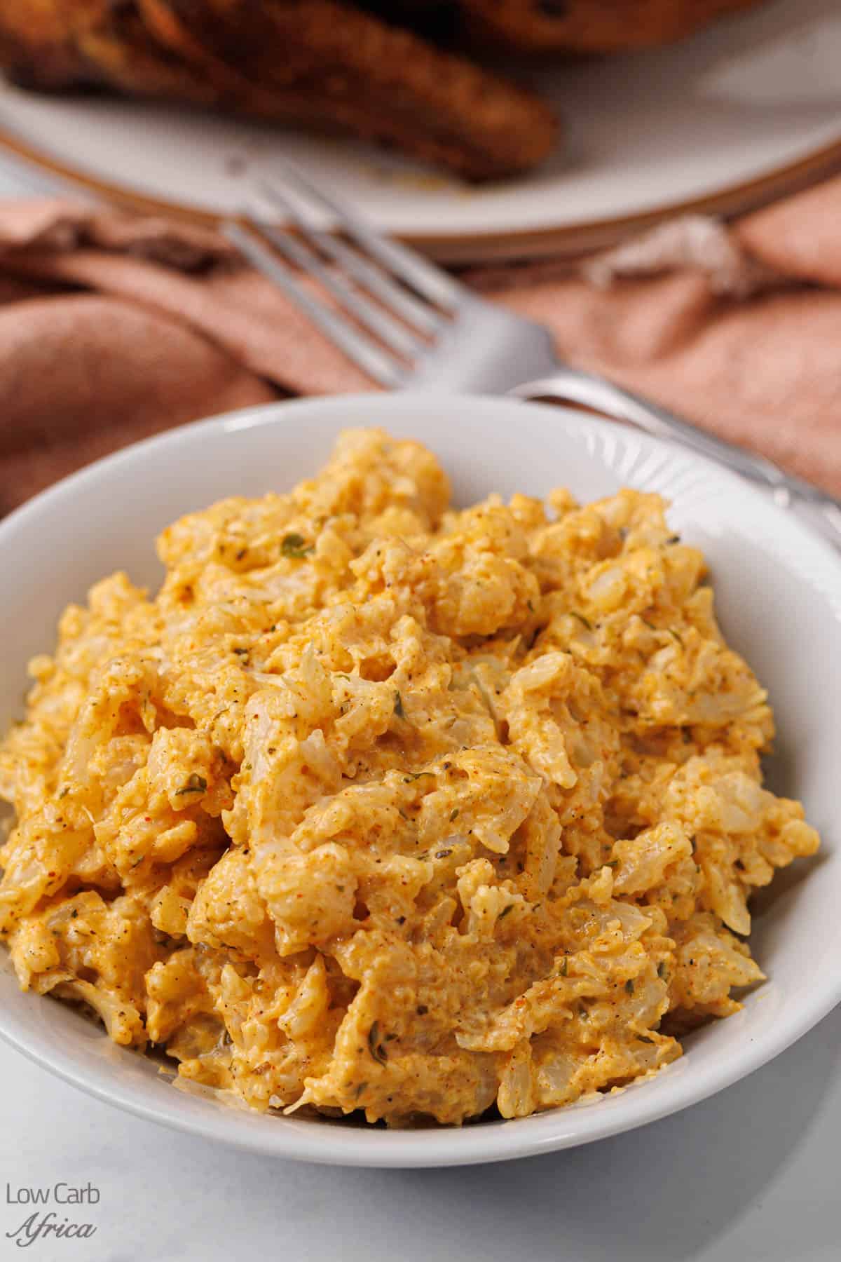 Keto macaroni and cheese in a white plate