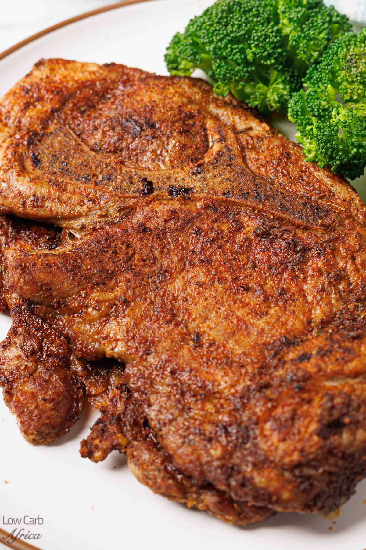 Air Fryer Pork Steak on a white plate